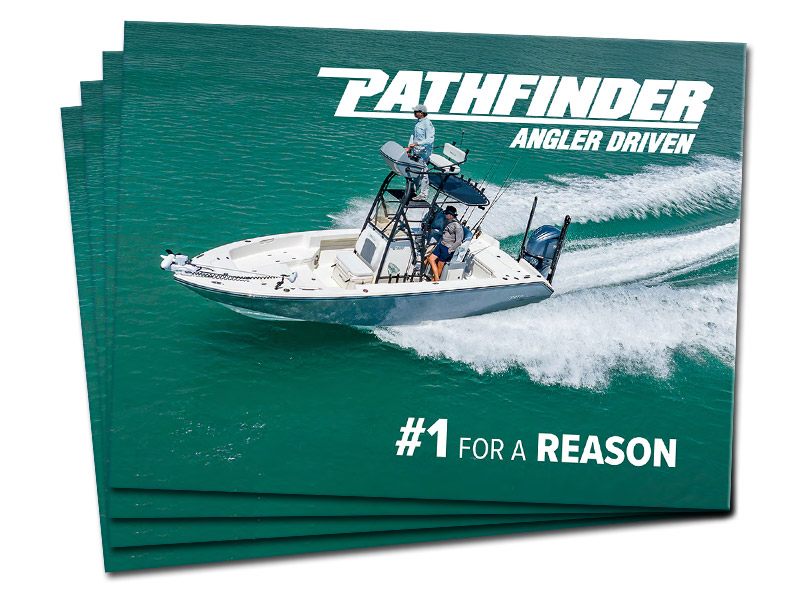 Several Pathfinder 2026 brochures fanned out, featuring the cover image of the 2400 TRS boat.
